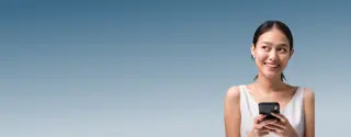 Happy woman on mobile device