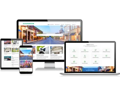 Website shown on a desktop computer, a laptop, a tablet and a phone