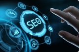 Persons hand hovering over digital screen with SEO